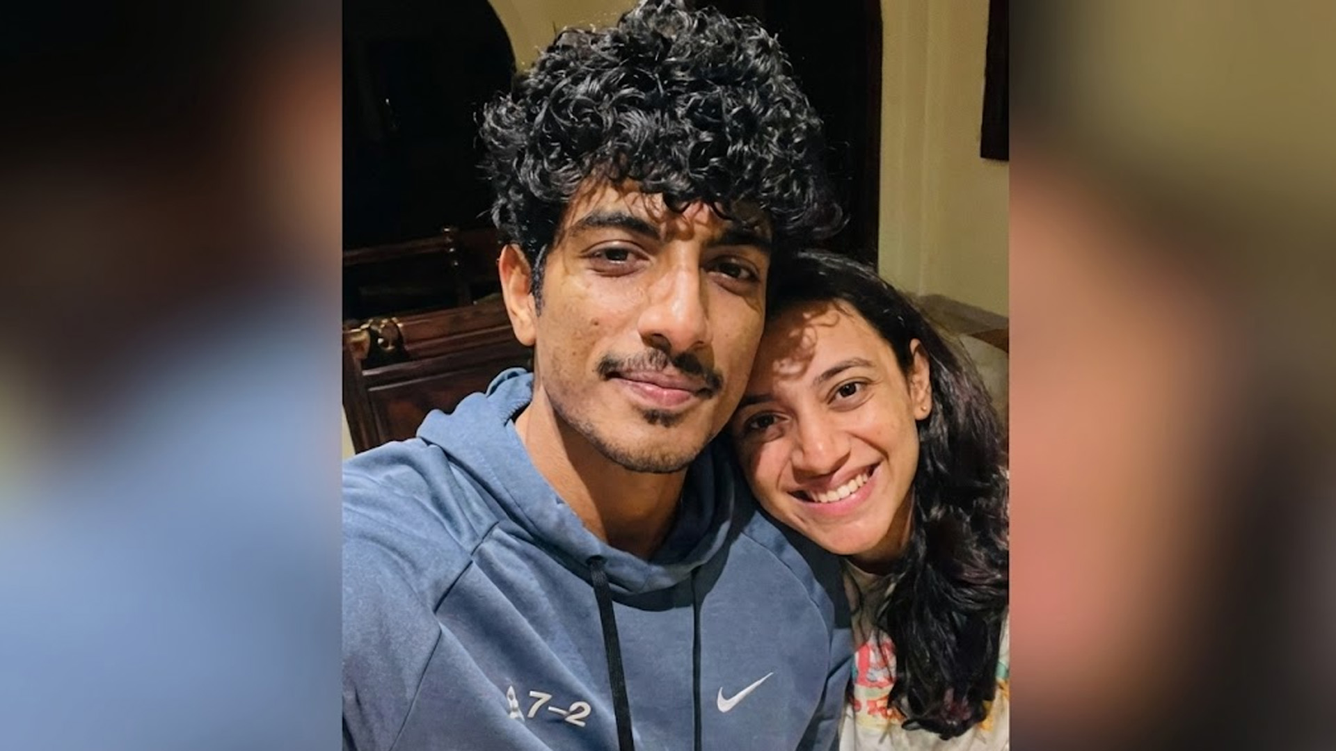 Smriti Mandhana and Palash Muchhal have postponed their wedding, with both updating their Instagram bios. Fans react as speculation grows around the delay.